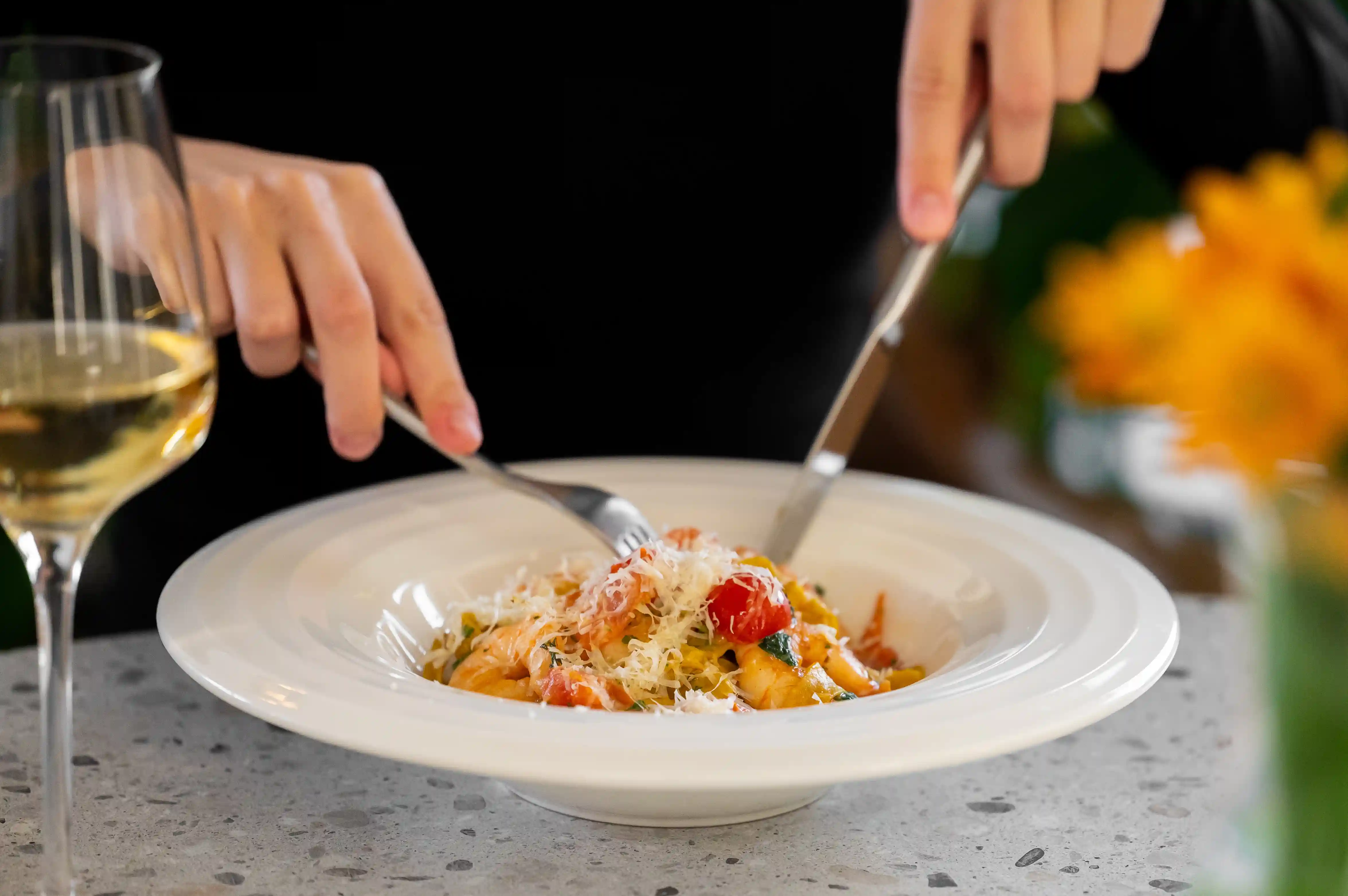 Pasta paired with wine at an Austin date night restaurant